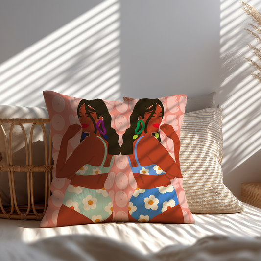 Decorative cushion cover with artistic mirrored illustration of two women in colourful floral swimwear against a peach background with circular patterns, perfect for modern boho home décor.