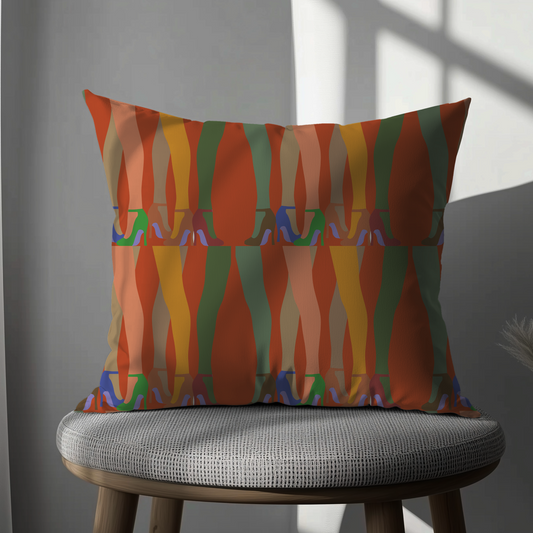 Decorative cushion cover featuring a bold leg and high heel print in vibrant colors on rich velvet fabric, styled in a modern sunlit interior.