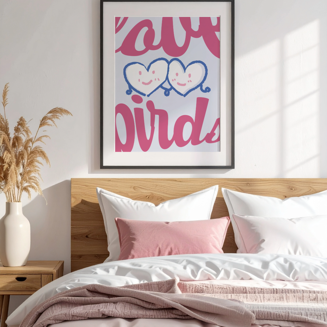 Bedroom with a bed, nightstand, and framed artwork on the wall.