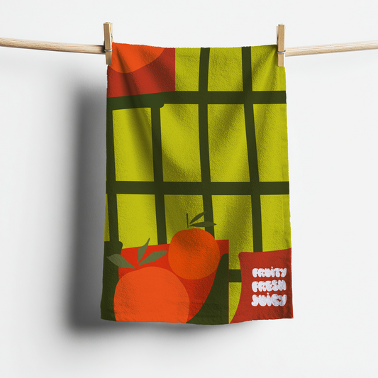 Colourful towel with citrus fruit design and text on a white background