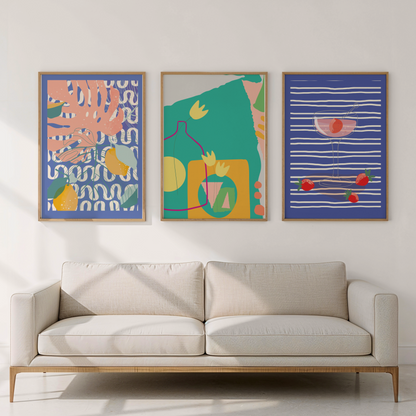 Beige sofa with three colorful abstract paintings on a white wall