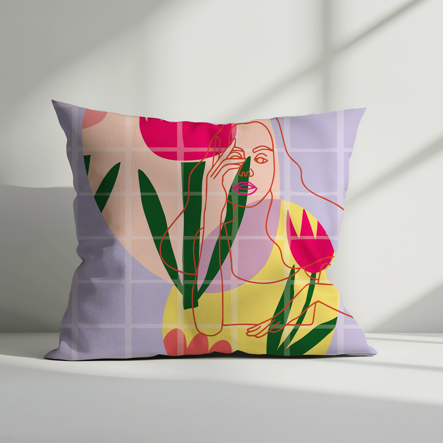 Decorative pillow with artistic design of a woman and flowers on a light background