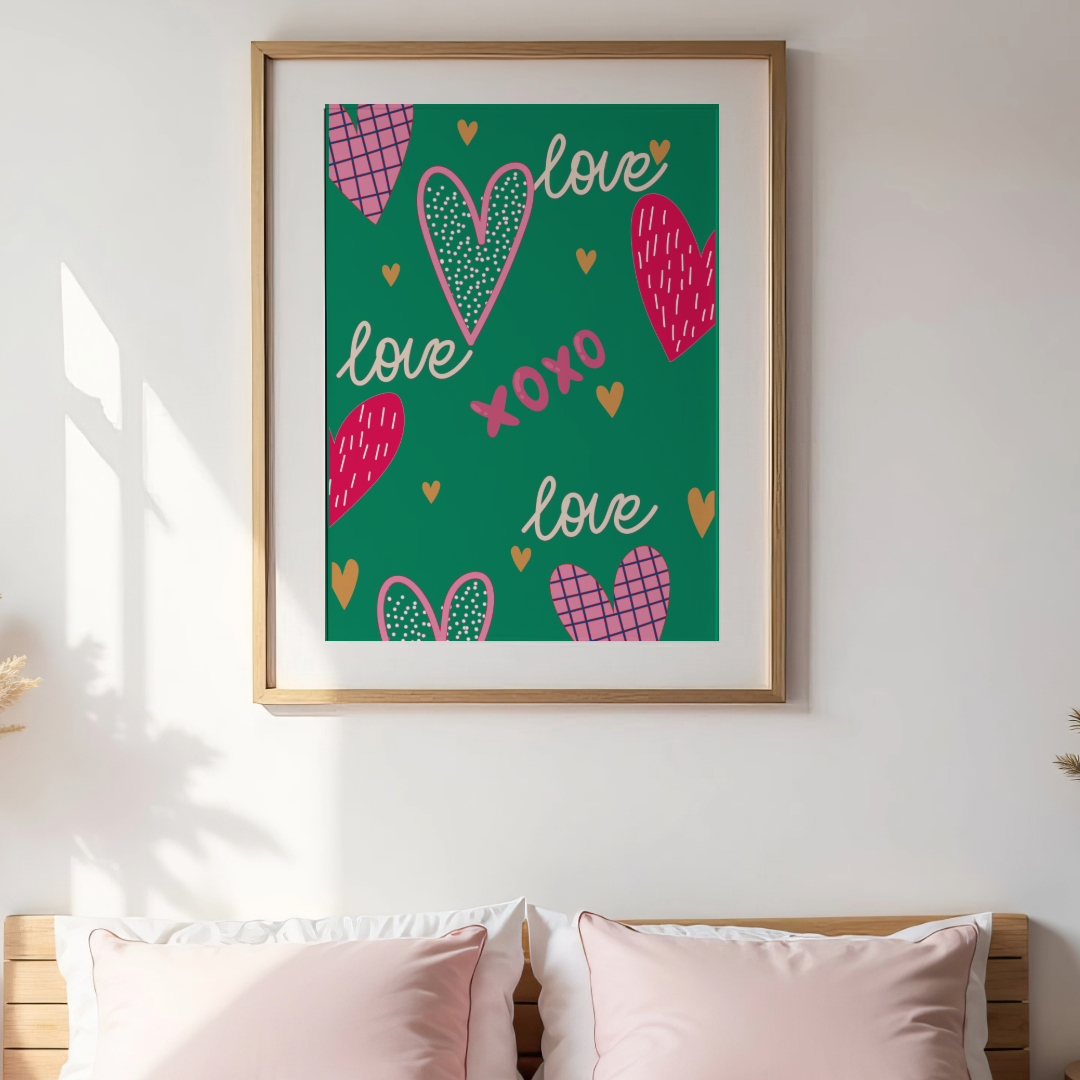 Framed artwork with heart designs and the word 'love' on a teal background, hanging above a bed.