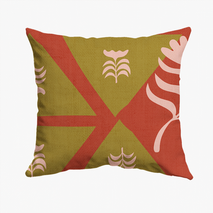 A square decorative throw pillow featuring a stylized flag-inspired pattern with olive green, terracotta red, and pale pink botanical motifs on a white background.