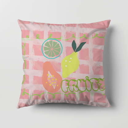 Decorative pillow with fruit illustrations and 'Fruity' text on a pink checkered background